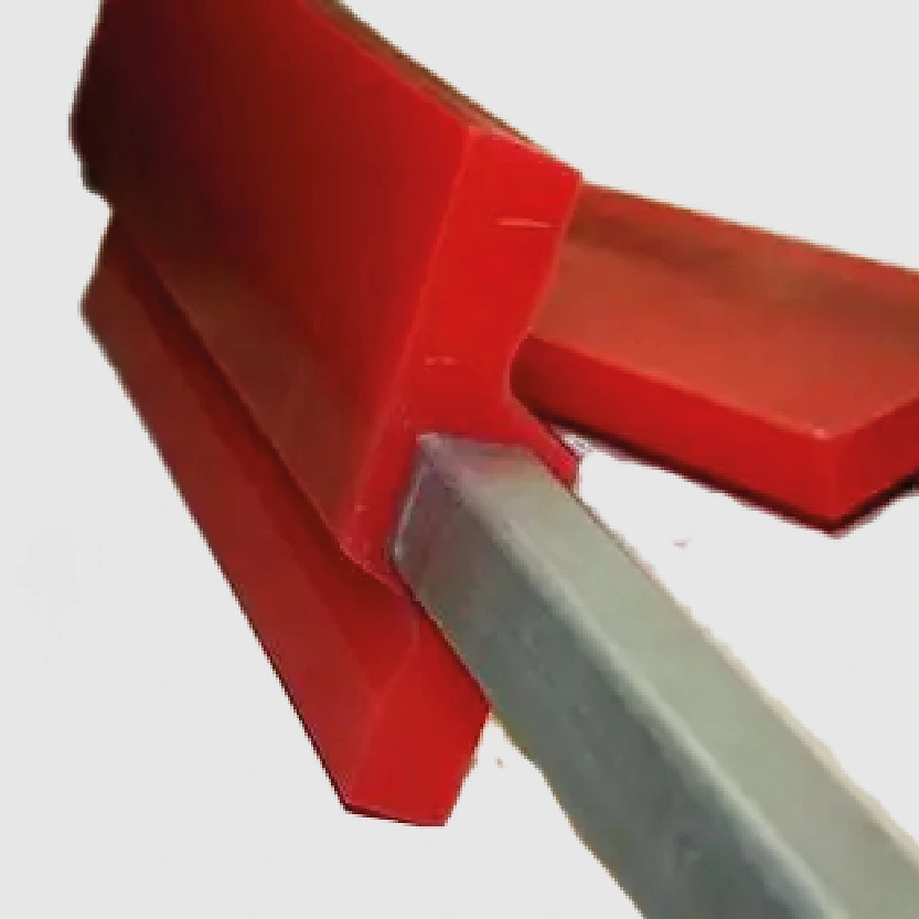 Cross-flip belt scraper